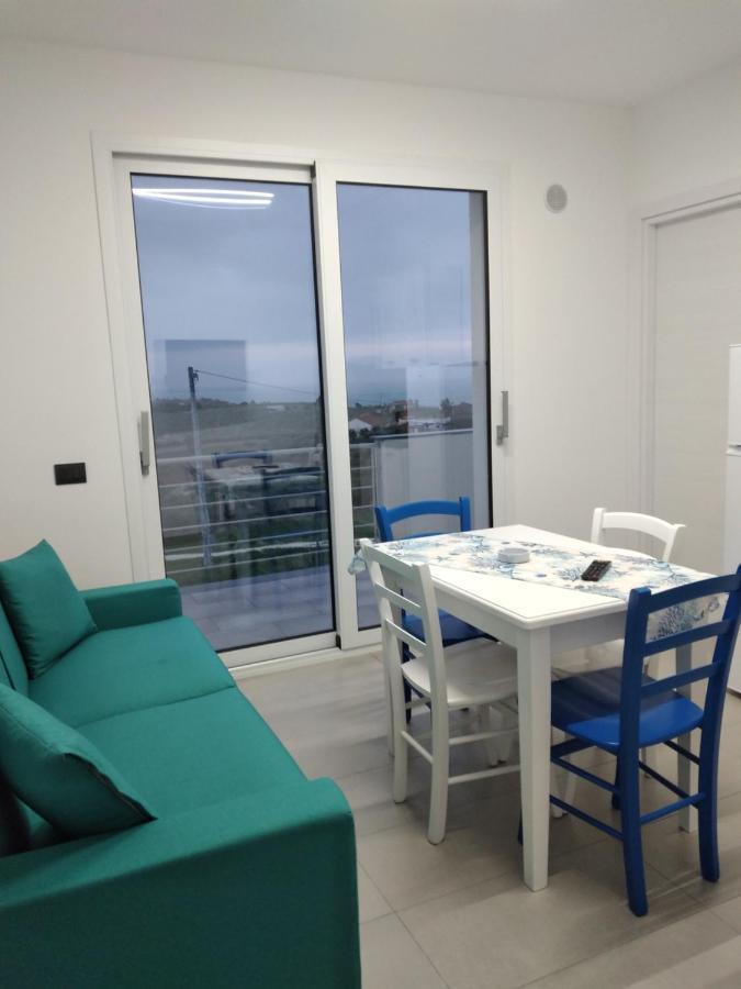 La Dama Bianca Bovo Marina Hotel มอนตาลเลโกร ภายนอก รูปภาพ