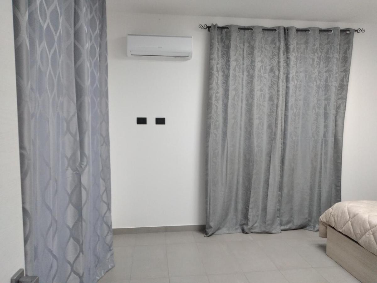 La Dama Bianca Bovo Marina Hotel มอนตาลเลโกร ภายนอก รูปภาพ